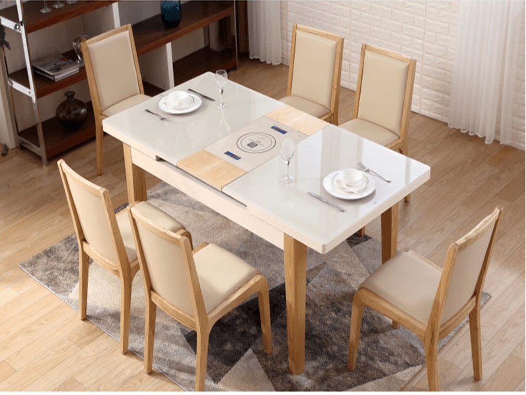 Mẫu bàn ăn thiết kế dạng chữ nhật kèm bếp từ khá phổ biến